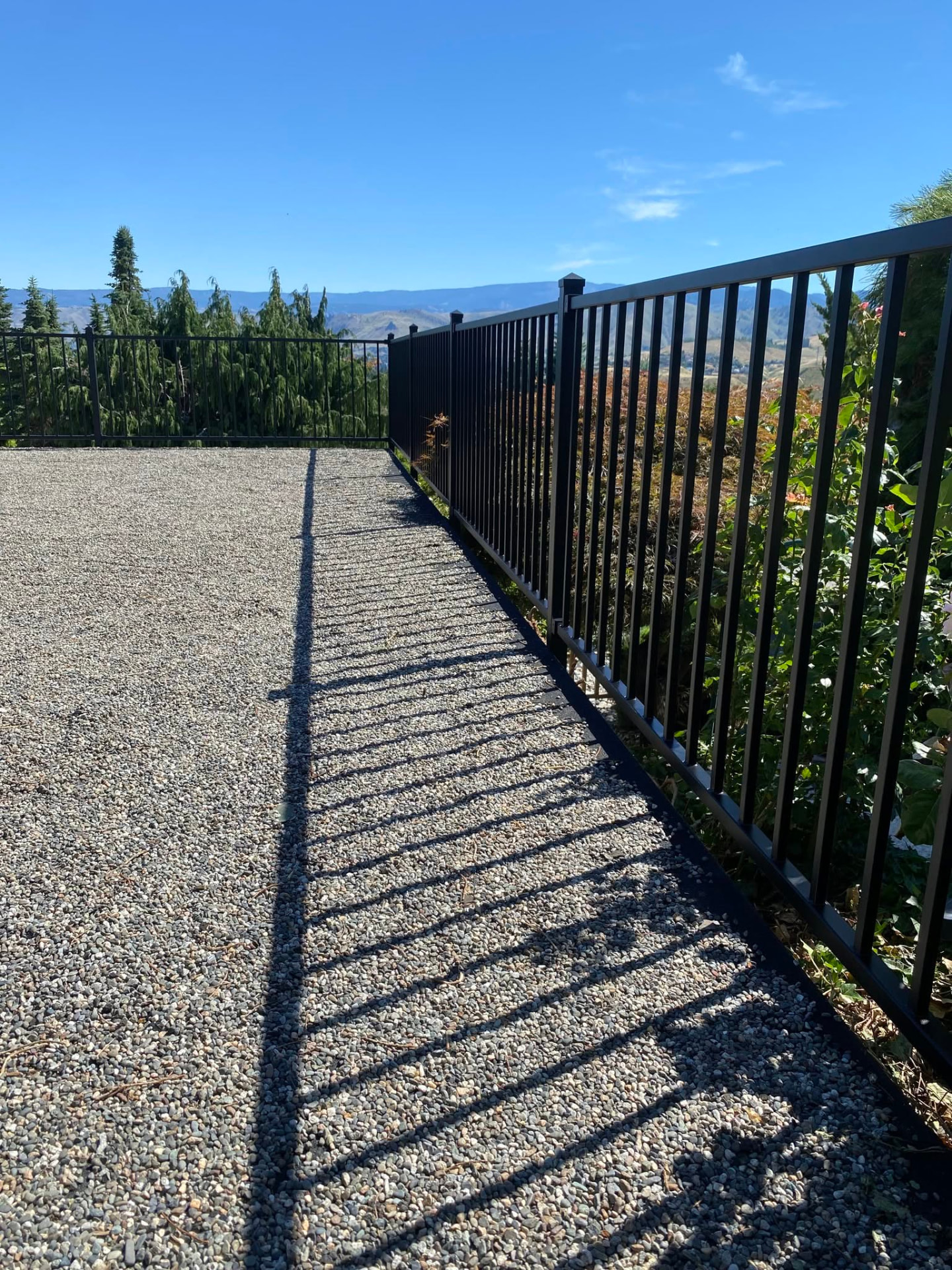 Black metal rooftop deck railing built in Wenatchee, WA — view 1