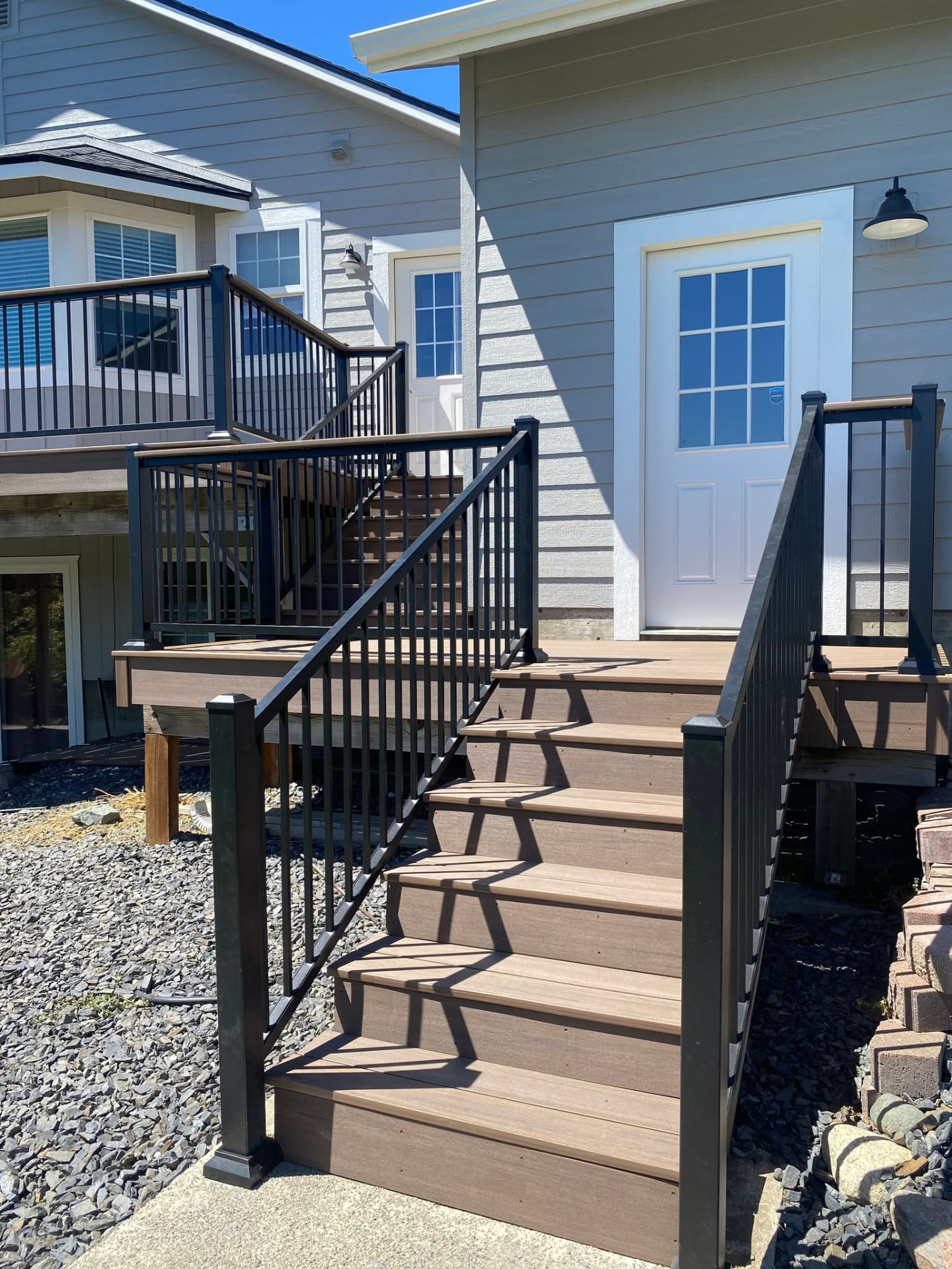 Composite deck with black railing and stairs built in Wenatchee, WA — view 6
