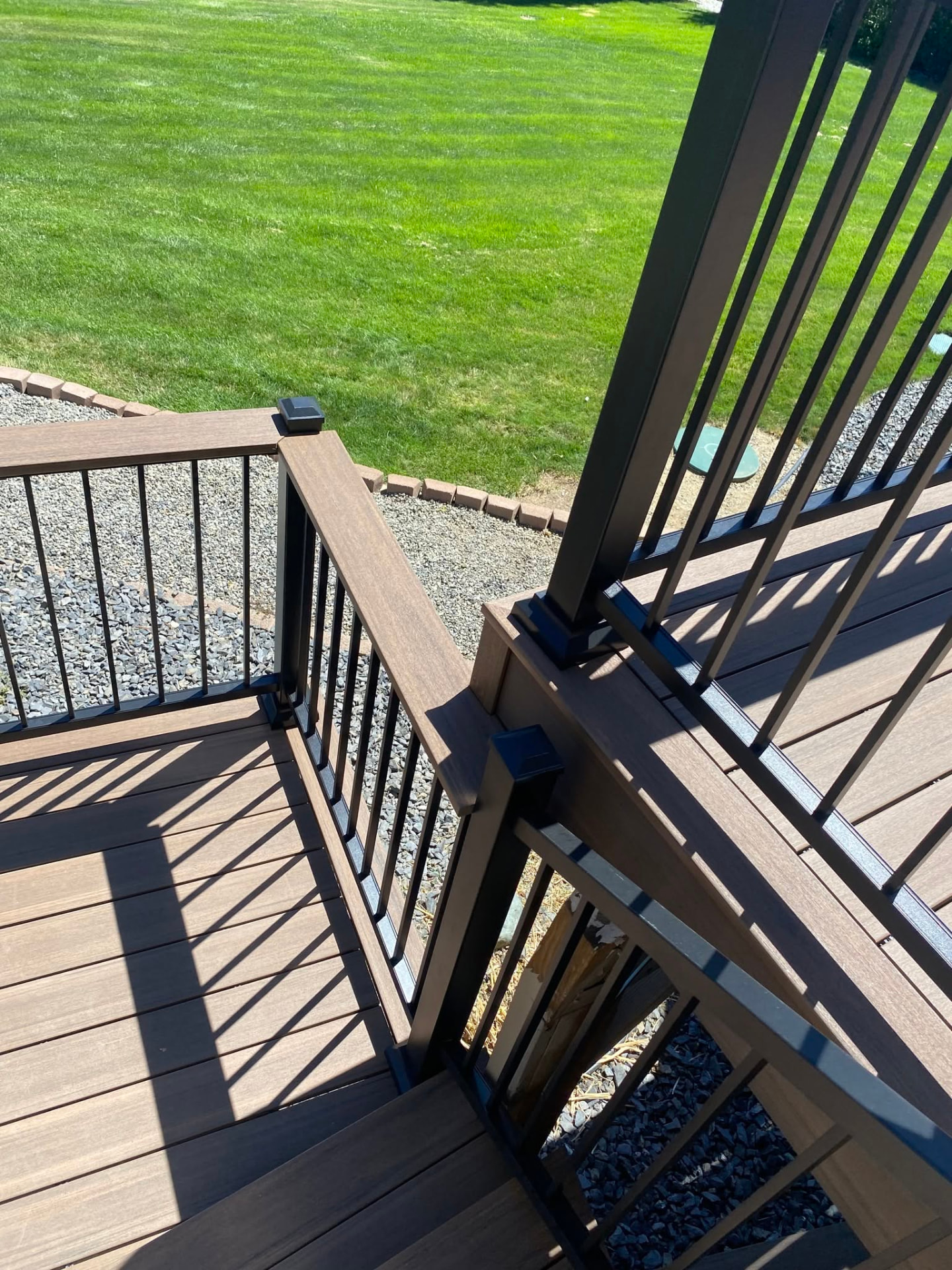 Composite deck with black railing and stairs built in Wenatchee, WA — view 8